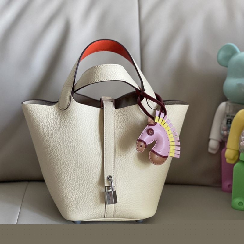 H**mes shopping bags